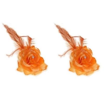 Spaanse of Hawaii thema haarbloem - 2x stuks - oranje - met speld/elastiek - verkleden - kunststof