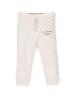 Calvin Klein Kids pantalon de jogging en coton à logo imprimé - Tons neutres