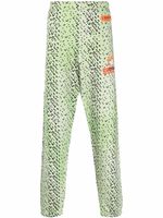 Heron Preston pantalon de jogging à motif abstrait - Vert