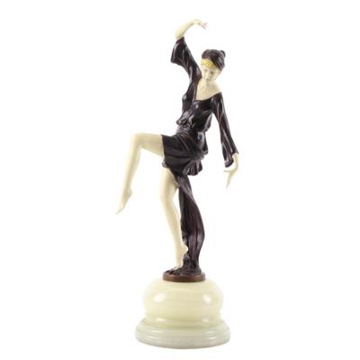 A BRONZE SCULPTURE CALLED "THE AUTUMN DANCER"