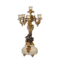 A PORCELAIN MOUNTED SIX-LIGHT BRONZE CANDELABRUM A PORCELAIN MOUNTED SIX-LIGHT BRONZE CANDELABRUM