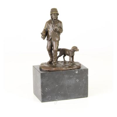A BRONZE SCULPTURE OF A HUNTER WITH HOUND