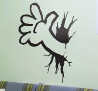 Sticker cartoon arm door muur