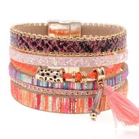 Leren multicolor roze Bohemian dames armband met bedel en kwastje - thumbnail