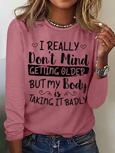 Women's I Really Don't Mind Getting Older But My Body Is Taking It Badly Casual Crew Neck Text Letters Shirt