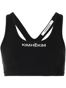 Kimhekim brassière de sport à logo imprimé - Noir