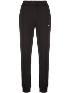 Calvin Klein pantalon de jogging à logo imprimé - Noir