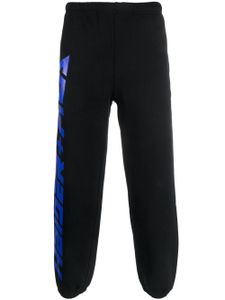 Haider Ackermann x Fila pantalon de jogging à logo imprimé - Noir