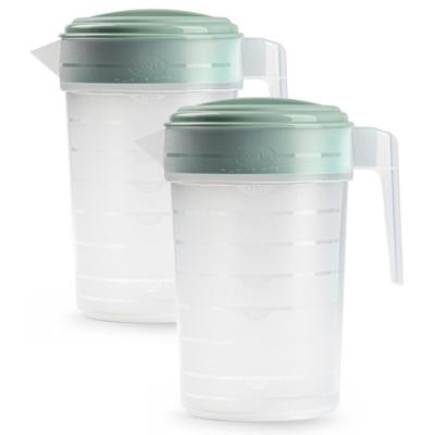 2x stuks schenkkan/waterkan met mintgroene deksel - 2l- transparant - kunststof 2x stuks schenkkan/waterkan met mintgroene deksel - 2l- transparant - kunststof