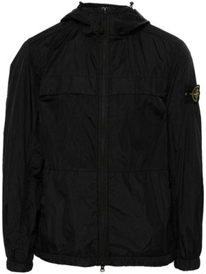 Stone Island veste légère à motif Compass signature - Noir