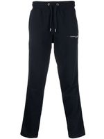 Tommy Hilfiger pantalon de jogging en coton à logo imprimé - Bleu