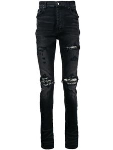 AMIRI jean skinny à effet usé - Noir