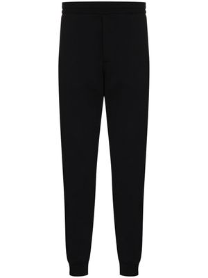 Alexander McQueen pantalon de jogging droit à bande logo - Noir