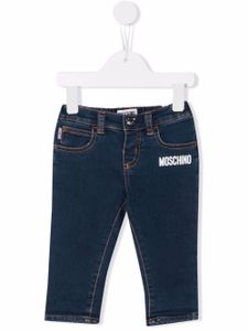 Moschino Kids jean à logo imprimé - Bleu