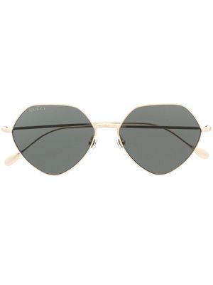 Gucci Eyewear lunettes de soleil à logo gravé - Or