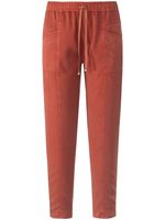Enkellange broek in jogg-pant-stijl model Cornelia Van Peter Hahn oranje