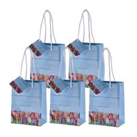 Set van 8x stuks papieren pasen giftbags/cadeau tasjes tulpen 11 x 14 x 6 cm