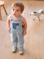 Denim babysalopette met contrasterende zakken gebleekt denim