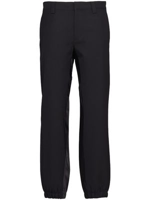 Prada pantalon en laine à plaque logo - Noir