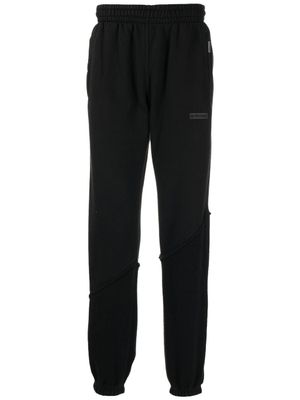 Represent pantalon de jogging à logo imprimé - Noir