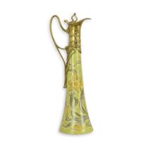 A BRONZE MOUNTED PORCELAIN CLARET JUG