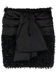 Balmain minijupe en tweed à design noué - Noir