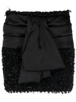 Balmain minijupe en tweed à design noué - Noir