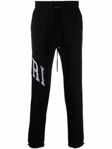 AMIRI pantalon de jogging à logo imprimé - Noir