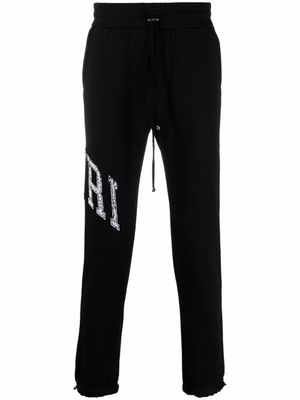 AMIRI pantalon de jogging à logo imprimé - Noir