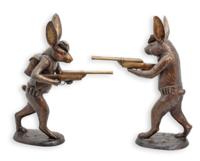 A PAIR OF TWO BRONZE HUNTING HARES A PAIR OF TWO BRONZE HUNTING HARES