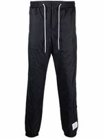 Thom Browne pantalon de jogging à patch logo - Bleu