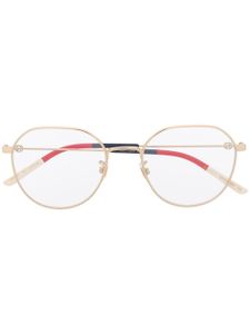 Gucci Eyewear lunettes de vue GG0684O à monture ronde - Or