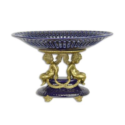 A BRONZE MOUNTED PORCELAIN CENTERPIECE