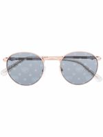 Chiara Ferragni lunettes de soleil CF 1002/S à monture ronde - Or