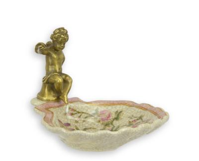 A BRONZE MOUNTED PORCELAIN SOAP HOLDER