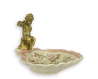 A BRONZE MOUNTED PORCELAIN SOAP HOLDER