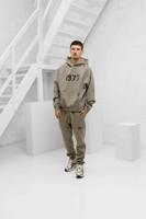 Fear Of God Essentials 1977 Trainingspak Heren Grijs - Maat S - Kleur: Grijs | Soccerfanshop