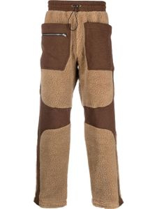 RANRA pantalon de jogging bicolore à design à empiècements - Marron