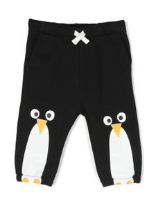 Stella McCartney Kids pantalon de jogging en coton à imprimé pingouin - Noir