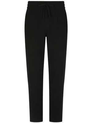 Dolce & Gabbana pantalon de jogging en cachemire à logo DG - Noir