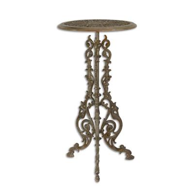 A CAST IRON PLANT TABLE, BROWN