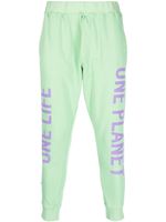 DSQUARED2 pantalon de jogging en coton à slogan imprimé - Vert