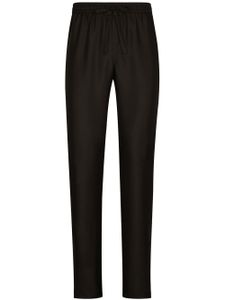 Dolce & Gabbana pantalon de jogging en soie à logo brodé - Noir