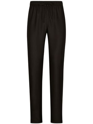 Dolce & Gabbana pantalon en soie à logo brodé DG Essentials - Noir