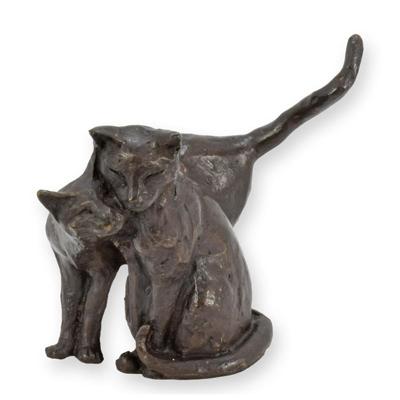A BRONZE SCULPTURE OF 2 CATS