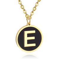 Goudkleurige Dames Schakelketting met Zwarte Kettinghanger Letter E