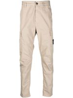 Stone Island pantalon fuselé 32710 à poches cargo - Tons neutres Stone Island pantalon fuselé 32710 à poches cargo - Tons neutres