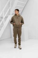 Cou7ure Essentials Rubber Trainingspak Heren Groen - Maat XL - Kleur: Groen | Soccerfanshop