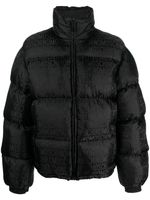 Moschino veste matelassée à motif monogrammé - Noir