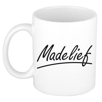 Madelief Naam koffiemok - beker - met sierlijke letters - wit - 300 ml - Cadeau - Dames Madelief Naam koffiemok - beker - met sierlijke letters - wit - 300 ml - Cadeau - Dames